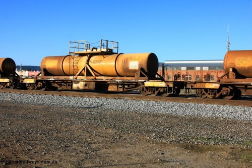 100609 09937
Midland, AQHY 30023 with sulphuric acid tank CSA 0017, originally built by the WAGR Midland Workshops in 1964/66 as a WF type flat waggon, then in 1997, following several recodes and modifications, was one of seventy five waggons converted to the WQH to carry CSA sulphuric acid tanks between Hampton/Kalgoorlie and Perth/Kwinana.
Keywords: AQHY-type;AQHY30023;WAGR-Midland-WS;WF-type;WFDY-type;WFDF-type;RFDF-type;WQH-type;