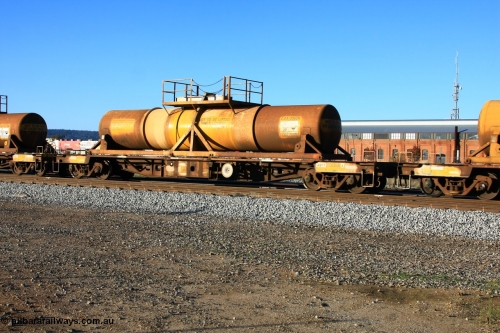 100609 09940
Midland, AQHY 30066 with sulphuric acid tank CSA 0052, originally built by the WAGR Midland Workshops in 1964/66 as a WF type flat waggon, then in 1997, following several recodes and modifications, was one of seventy five waggons converted to the WQH to carry CSA sulphuric acid tanks between Hampton/Kalgoorlie and Perth/Kwinana.
Keywords: AQHY-type;AQHY30066;WAGR-Midland-WS;WF-type;WFW-type;WFDY-type;WFDF-type;RFDF-type;WQH-type;