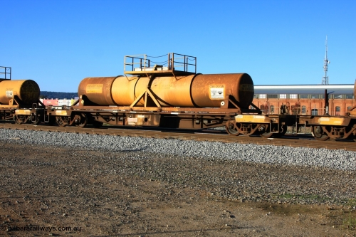 100609 09941
Midland, AQHY 30058 with sulphuric acid tank CSA 0073, originally built by the WAGR Midland Workshops in 1964/66 as a WF type flat waggon, then in 1997, following several recodes and modifications, was one of seventy five waggons converted to the WQH to carry CSA sulphuric acid tanks between Hampton/Kalgoorlie and Perth/Kwinana.
Keywords: AQHY-type;AQHY30058;WAGR-Midland-WS;WF-type;WFW-type;WFDY-type;WFDF-type;RFDF-type;WQH-type;