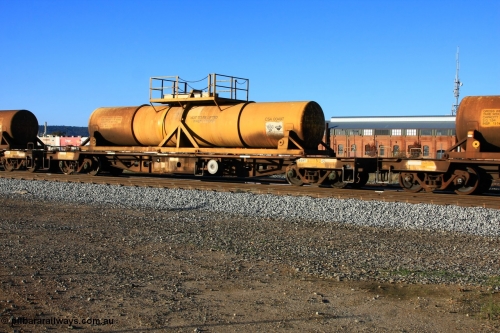 100609 09942
Midland, AQHY 30052 with sulphuric acid tank CSA 0049, originally built by the WAGR Midland Workshops in 1964/66 as a WF type flat waggon, then in 1997, following several recodes and modifications, was one of seventy five waggons converted to the WQH to carry CSA sulphuric acid tanks between Hampton/Kalgoorlie and Perth/Kwinana.
Keywords: AQHY-type;AQHY30052;WAGR-Midland-WS;WF-type;WFDY-type;WFDF-type;RFDF-type;WQH-type;