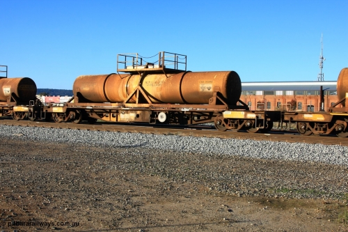 100609 09946
Midland, AQHY 30034 with sulphuric acid tank CSA 0024, originally built by the WAGR Midland Workshops in 1964/66 as a WF type flat waggon, then in 1997, following several recodes and modifications, was one of seventy five waggons converted to the WQH to carry CSA sulphuric acid tanks between Hampton/Kalgoorlie and Perth/Kwinana.
Keywords: AQHY-type;AQHY30034;WAGR-Midland-WS;WF-type;WFDY-type;WFDF-type;RFDF-type;WQH-type;