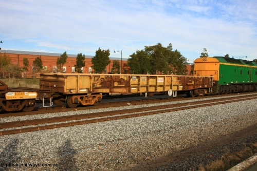 100611 0309
Midland, AOXY 33153, converted to carry nickel matte bulk bags, in WGL traffic. Built by WAGR Midland Workshops in 1969 as part of a batch of fifty eight WGX type open waggons, in 1981 to WOAX, then AOAY type.
Keywords: AOXY-type;AOXY33153;WAGR-Midland-WS;WGX-type;WOAX-type;