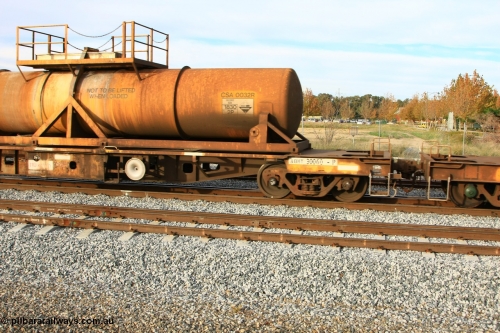 100611 0314
Midland, AQHY 30060 with sulphuric acid tank CSA 0032, originally built by the WAGR Midland Workshops in 1964/66 at WF type flat waggons, then following several codes and modifications in 1997 seventy five were converted to WQH to carry CSA sulphuric acid tanks between Hampton/Kalgoorlie and Perth/Kwinana.
Keywords: AQHY-type;AQHY30060;WAGR-Midland-WS;WF-type;WFL-type;WFDY-type;WFDF-type;RFDF-type;WQH-type;