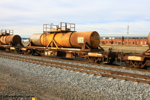 100611 0321
Midland, AQHY 30062 with sulphuric acid tank CSA 0046, originally built by the WAGR Midland Workshops in 1964/66 at WF type flat waggons, then following several codes and modifications in 1997 seventy five were converted to WQH to carry CSA sulphuric acid tanks between Hampton/Kalgoorlie and Perth/Kwinana.
Keywords: AQHY-type;AQHY30062;WAGR-Midland-WS;WF-type;WFDY-type;WFDF-type;RFDF-type;WQH-type;