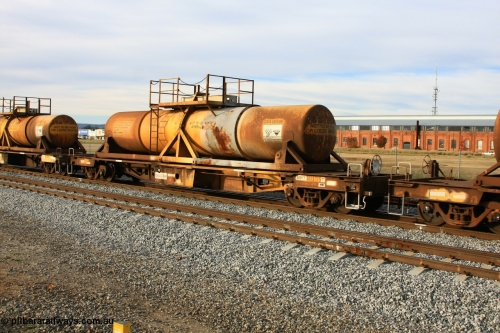 100611 0327
Midland, AQHY 30105 with sulphuric acid tank CSA 0059, originally built by the WAGR Midland Workshops in 1964/66 at WF type flat waggons, then following several codes and modifications in 1997 seventy five were converted to WQH to carry CSA sulphuric acid tanks between Hampton/Kalgoorlie and Perth/Kwinana.
Keywords: AQHY-type;AQHY30105;WAGR-Midland-WS;WF-type;WFP-type;WFDY-type;WFDF-type;RFDF-type;WQH-type;