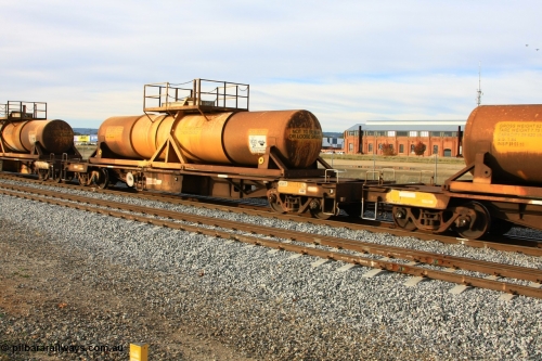 100611 0329
Midland, AQHY 30049 with sulphuric acid tank CSA 0031, originally built by the WAGR Midland Workshops in 1964/66 at WF type flat waggons, then following several codes and modifications in 1997 seventy five were converted to WQH to carry CSA sulphuric acid tanks between Hampton/Kalgoorlie and Perth/Kwinana.
Keywords: AQHY-type;AQHY30049;WAGR-Midland-WS;WF-type;WFDY-type;WFDF-type;RFDF-type;WQH-type;