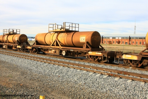 100611 0334
Midland, AQHY 30017 with sulphuric acid tank CSA 0051, originally built by the WAGR Midland Workshops in 1964/66 at WF type flat waggons, then following several codes and modifications in 1997 seventy five were converted to WQH to carry CSA sulphuric acid tanks between Hampton/Kalgoorlie and Perth/Kwinana.
Keywords: AQHY-type;AQHY30017;WAGR-Midland-WS;WF-type;WFDY-type;WFDF-type;RFDF-type;WQH-type;