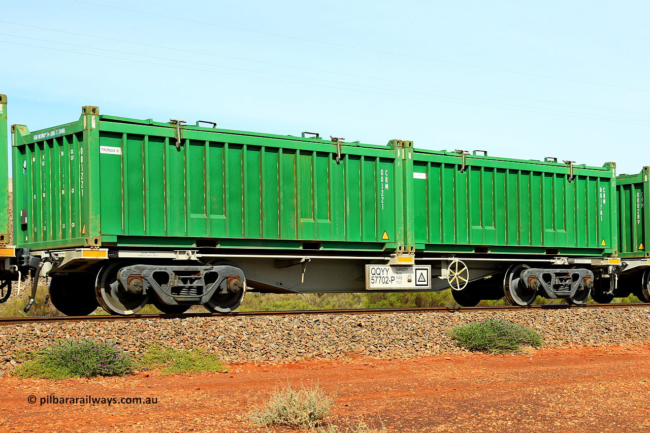 231020 8199
Parkeston, QQYY type 40' container waggon QQYY 57702 one of five hundred ordered by Aurizon and built by CRRC Yangtze Group of China in 2022. In service with two loaded 20' half height hard top 'rotainers' lettered CRM, for Cristal Mining before they were absorbed into Tronox, CRM 001701 with Cristal decal and CRM 001221 with Tronox decal, on Aurizon's Tronox mineral sands train 4UP1 from Ivanhoe / Broken Hill (NSW) to Kwinana (WA). 20th of October 2023.
Keywords: QQYY-type;QQYY57702;CRRC-Yangtze-Group-China;