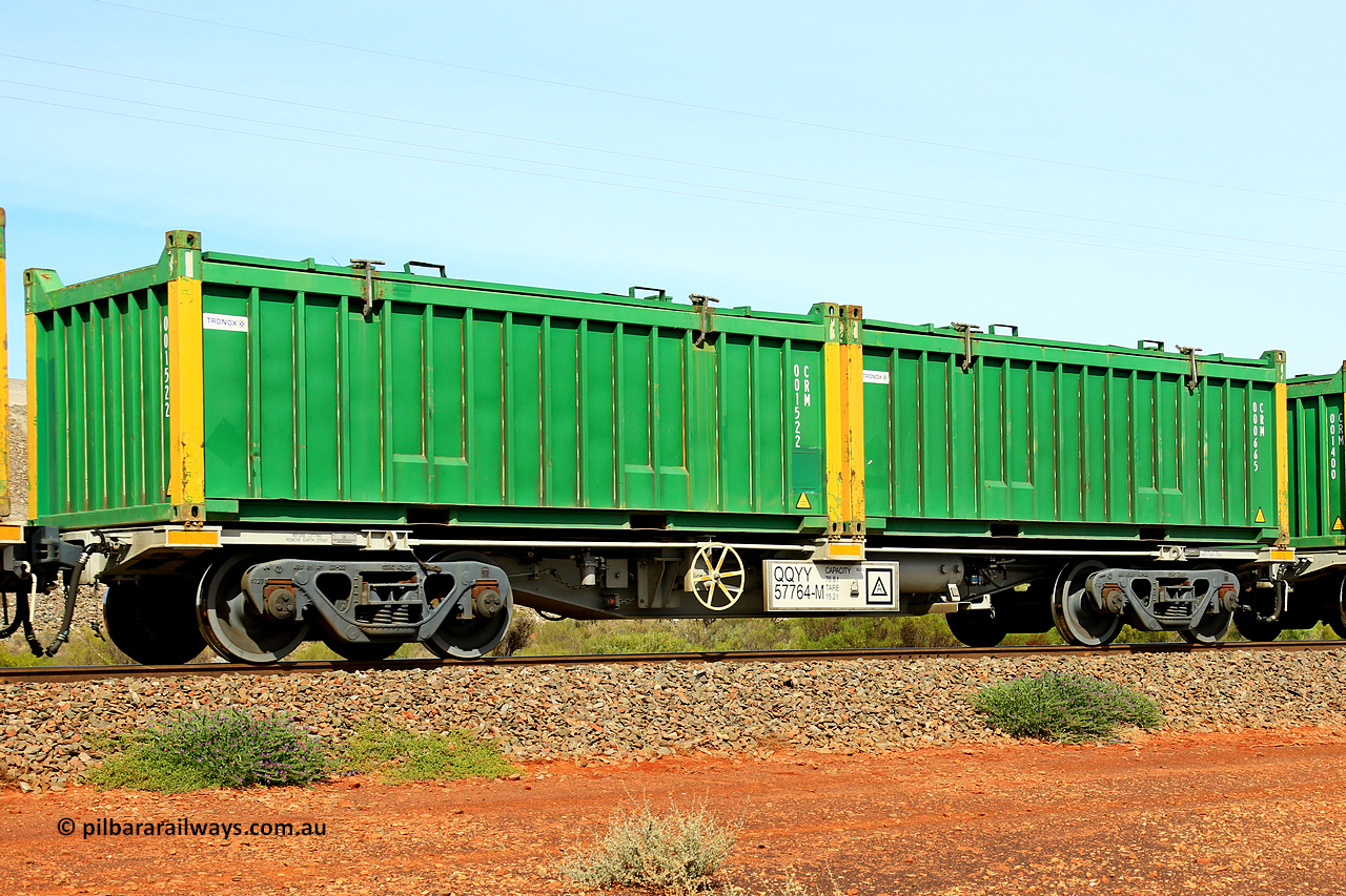 231020 8209
Parkeston, QQYY type 40' container waggon QQYY 57764 one of five hundred ordered by Aurizon and built by CRRC Yangtze Group of China in 2022. In service with two loaded 20' half height hard top 'rotainers' lettered CRM, for Cristal Mining before they were absorbed into Tronox, CRM 000665 with Tronox decal and yellow corner posts and CRM 001522 with Tronox decal and yellow corner posts, on Aurizon's Tronox mineral sands train 4UP1 from Ivanhoe / Broken Hill (NSW) to Kwinana (WA). 20th of October 2023.
Keywords: QQYY-type;QQYY57764;CRRC-Yangtze-Group-China;