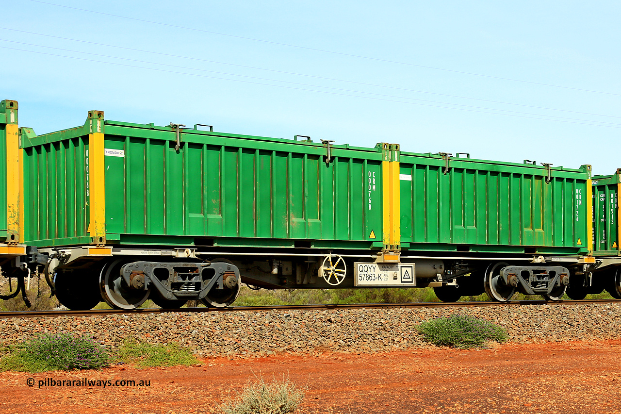 231020 8211
Parkeston, QQYY type 40' container waggon QQYY 57863 one of five hundred ordered by Aurizon and built by CRRC Yangtze Group of China in 2022. In service with two loaded 20' half height hard top 'rotainers' lettered CRM, for Cristal Mining before they were absorbed into Tronox, CRM 001726 with Cristal decal and yellow corner posts and CRM 000768 with Tronox decal and yellow corner posts, on Aurizon's Tronox mineral sands train 4UP1 from Ivanhoe / Broken Hill (NSW) to Kwinana (WA). 20th of October 2023.
Keywords: QQYY-type;QQYY57863;CRRC-Yangtze-Group-China;