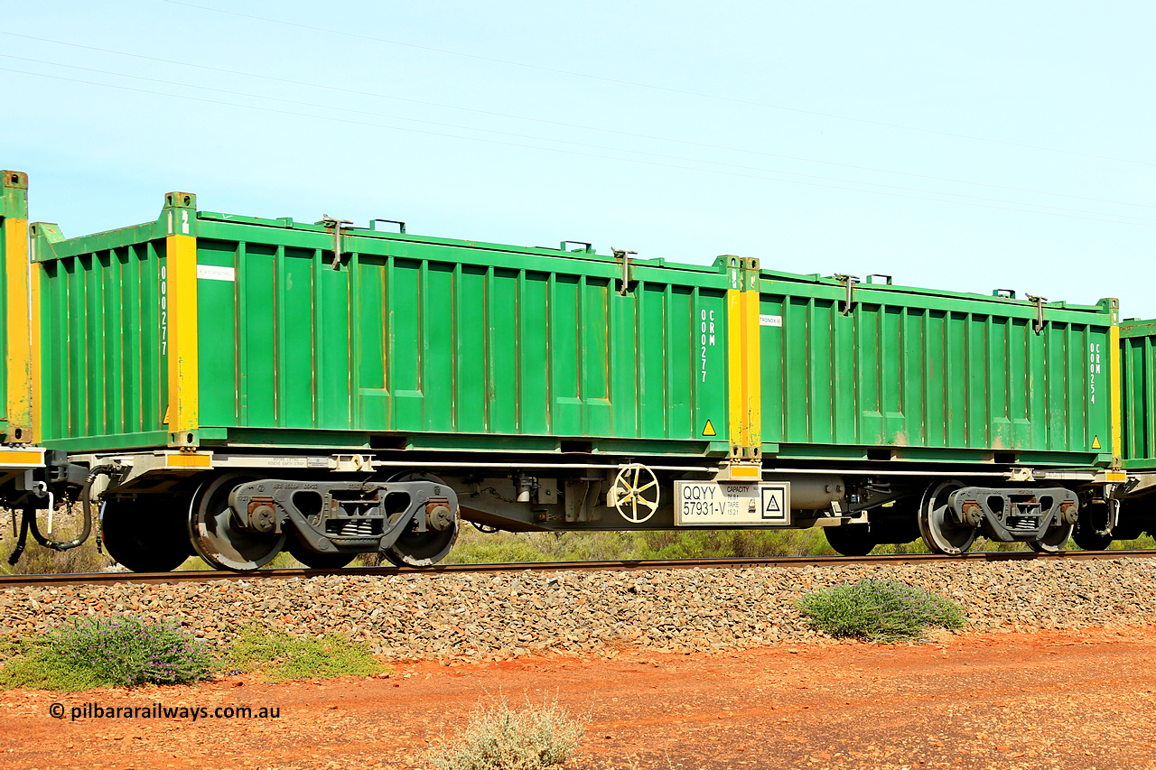 231020 8219
Parkeston, QQYY type 40' container waggon QQYY 57931 one of five hundred ordered by Aurizon and built by CRRC Yangtze Group of China in 2022. In service with two loaded 20' half height hard top 'rotainers' lettered CRM, for Cristal Mining before they were absorbed into Tronox, CRM 000254 with Tronox decal and yellow corner posts and CRM 000277 with Cristal decal and yellow corner posts, on Aurizon's Tronox mineral sands train 4UP1 from Ivanhoe / Broken Hill (NSW) to Kwinana (WA). 20th of October 2023.
Keywords: QQYY-type;QQYY57931;CRRC-Yangtze-Group-China;