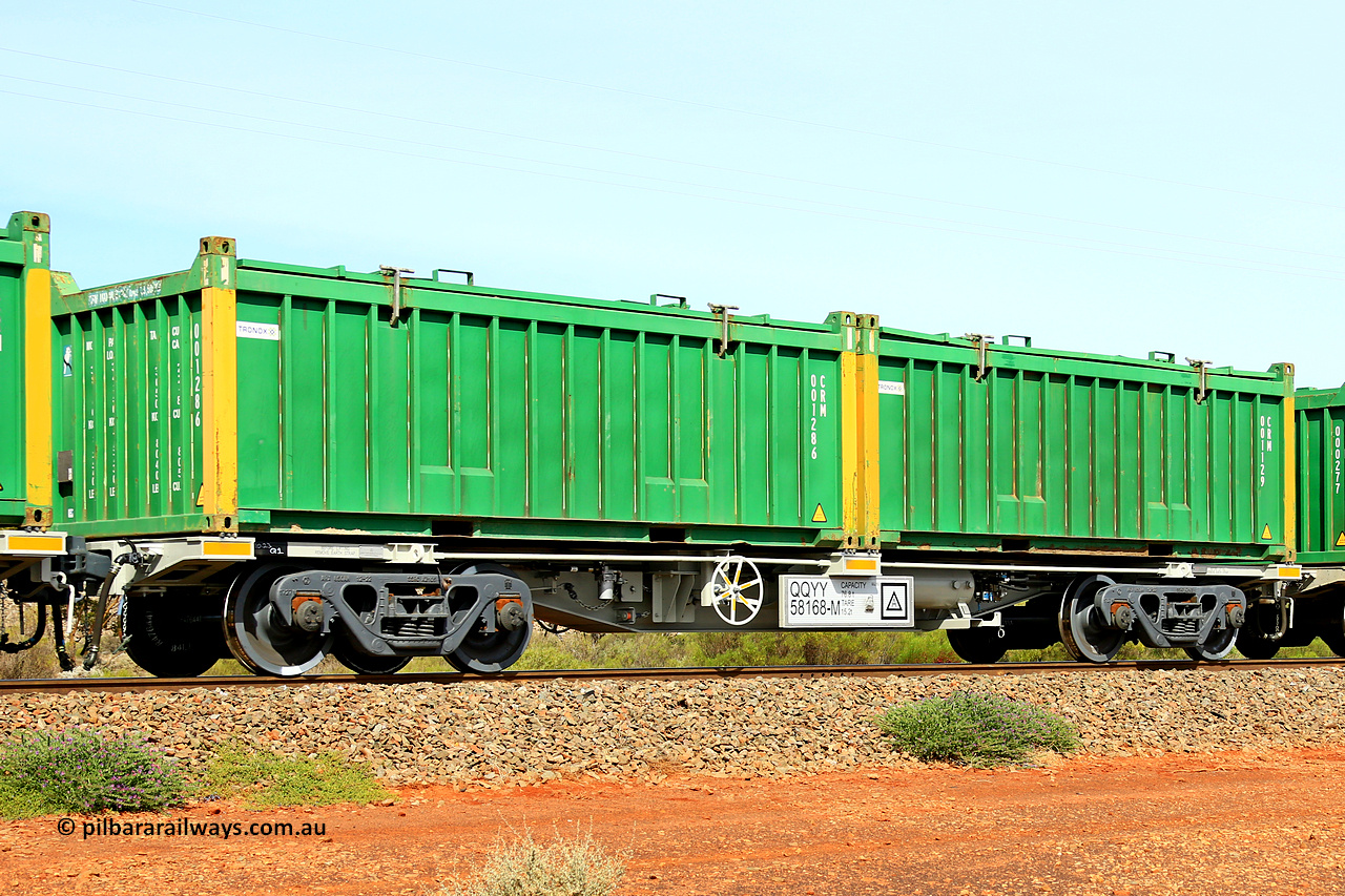 231020 8220
Parkeston, QQYY type 40' container waggon QQYY 58168 one of five hundred ordered by Aurizon and built by CRRC Yangtze Group of China in 2022. In service with two loaded 20' half height hard top 'rotainers' lettered CRM, for Cristal Mining before they were absorbed into Tronox, CRM 001129 with Tronox decal and yellow corner posts and CRM 001286 with Tronox decal and yellow corner posts, on Aurizon's Tronox mineral sands train 4UP1 from Ivanhoe / Broken Hill (NSW) to Kwinana (WA). 20th of October 2023.
Keywords: QQYY-type;QQYY58168;CRRC-Yangtze-Group-China;