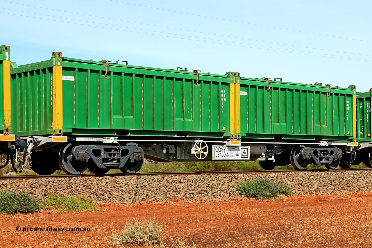 231020 8221
Parkeston, QQYY type 40' container waggon QQYY 58159 one of five hundred ordered by Aurizon and built by CRRC Yangtze Group of China in 2022. In service with two loaded 20' half height hard top 'rotainers' lettered CRM, for Cristal Mining before they were absorbed into Tronox, CRM 000364 with Tronox decal and yellow corner posts and CRM 000472 with Tronox decal and yellow corner posts, on Aurizon's Tronox mineral sands train 4UP1 from Ivanhoe / Broken Hill (NSW) to Kwinana (WA). 20th of October 2023.
Keywords: QQYY-type;QQYY58159;CRRC-Yangtze-Group-China;