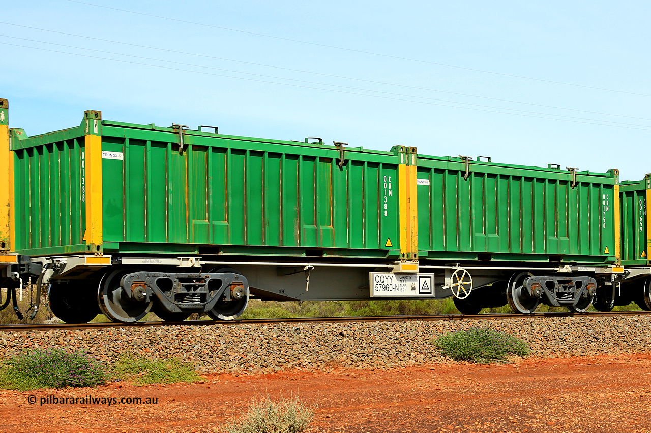 231020 8228
Parkeston, QQYY type 40' container waggon QQYY 57960 one of five hundred ordered by Aurizon and built by CRRC Yangtze Group of China in 2022. In service with two loaded 20' half height hard top 'rotainers' lettered CRM, for Cristal Mining before they were absorbed into Tronox, CRM 001750 with Tronox decal and yellow corner posts and CRM 001388 with Tronox decal and yellow corner posts, on Aurizon's Tronox mineral sands train 4UP1 from Ivanhoe / Broken Hill (NSW) to Kwinana (WA). 20th of October 2023.
Keywords: QQYY-type;QQYY57960;CRRC-Yangtze-Group-China;