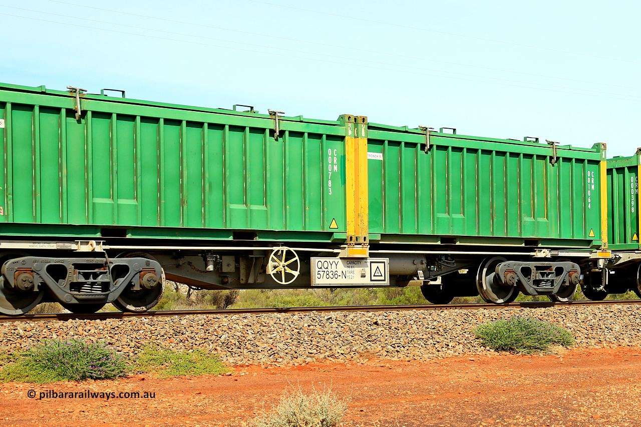 231020 8235
Parkeston, QQYY type 40' container waggon QQYY 57836 one of five hundred ordered by Aurizon and built by CRRC Yangtze Group of China in 2022. In service with two loaded 20' half height hard top 'rotainers' lettered CRM, for Cristal Mining before they were absorbed into Tronox, CRM 001064 with Tronox decal and yellow corner posts and CRM 000783 with Tronox decal and yellow corner posts, on Aurizon's Tronox mineral sands train 4UP1 from Ivanhoe / Broken Hill (NSW) to Kwinana (WA). 20th of October 2023.
Keywords: QQYY-type;QQYY57836;CRRC-Yangtze-Group-China;
