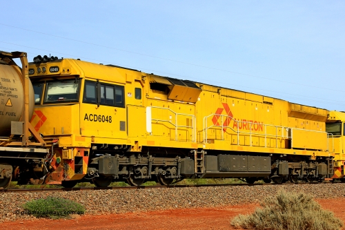 231020 8142
Parkeston, ACD class locomotive ACD 6048 built by Goninan NSW as a GE C44ACi model in April 2022, trails on 4UP1 along the mainline at Parkeston enroute to Kwinana, October 20, 2023.
Keywords: ACD-class;ACD6048;Goninan-NSW;GE;C44ACi;