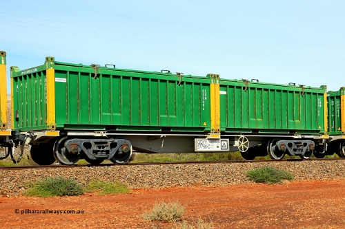 231020 8170
Parkeston, QQYY type 40' container waggon QQYY 57768 one of five hundred ordered by Aurizon and built by CRRC Yangtze Group of China in 2022. In service with two loaded 20' half height hard top 'rotainers' lettered CRM, for Cristal Mining before they were absorbed into Tronox, CRM 000108 with Cristal decal and yellow corner posts and CRM 000686 with Tronox decal and yellow corner posts, on Aurizon's Tronox mineral sands train 4UP1 from Ivanhoe / Broken Hill (NSW) to Kwinana (WA). October 20, 2023.
Keywords: QQYY-type;QQYY57768;CRRC-Yangtze-Group-China;
