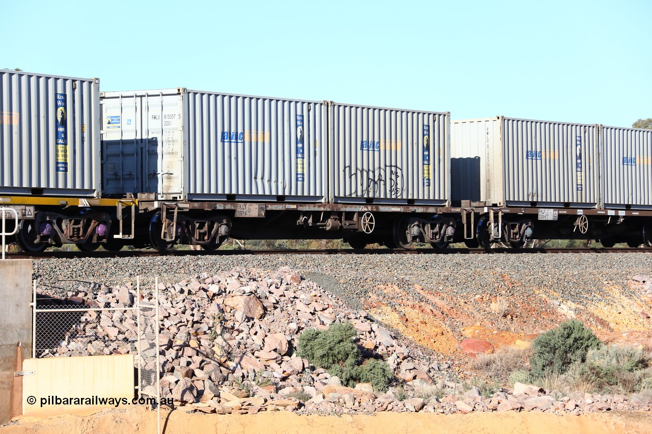 160522 2060
Binduli, 5MP2 steel train, RKLY 20981 container waggon, originally built by EPT NSW in 1980-81 as an BDY / NODY open waggon before being heavily modified with a pair of Royal Wolf 20' 22G1 type containers with Pacific National decals, RWLU 815057 and RWLU 815016.
Keywords: RKLY-type;RKLY20981;EPT-NSW;BDY-type;NODY-type;
