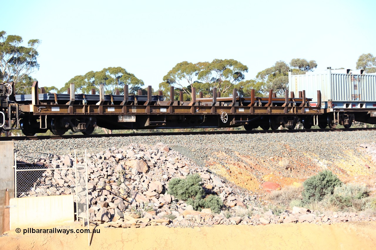 160522 2063
Binduli, 5MP2 steel train, jumbo steel plate waggon RKXF 60205, originally built by Comeng NSW as a BCX type in 1971-72 as part of a batch of fifty 75 foot long flat waggons and originally BCX 21810, here it is loaded with steel plates.
Keywords: RKXF-type;RKXF60205;Comeng-NSW;BCX-type;BCX21810;NFBX-type;NQBX-type;NQDX-type;NKDX-type;RKXX-type;