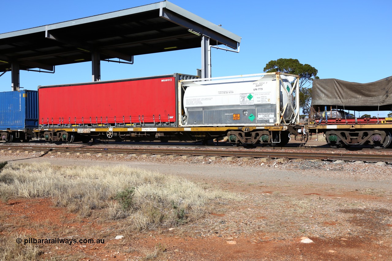 160522 2128
Parkeston, 6MP4 intermodal train, RQGY 34488 container waggon, one of a hundred built by Tulloch Ltd NSW as OCY type in 1974/75, recoded to NQOY, then modified to NQGY, loaded here with Air Liquide WA 20' ISO 22T7 type tanktainer AFLU 100032 and a 40' Royal Wolf curtainsider RWTU 903124.
Keywords: RQGY-type;RQGY34488;Tulloch-Ltd-NSW;OCY-type;NQOY-type;NQSY-type;NQGY-type;