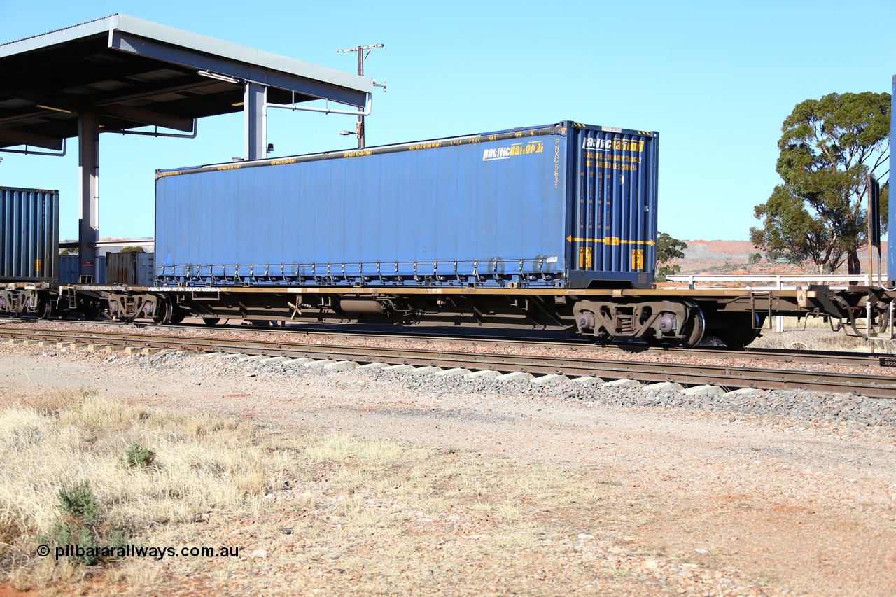 160522 2150
Parkeston, 6MP4 intermodal train, RQPW 60076 jumbo container waggon built by V/Line Bendigo Workshops in October 1984 as VQDW 68 as part of a batch of twenty-five, leased to the SRA NSW in 1986 as NQDW, then recoded in 1995 to RQPW, loaded with Pacific National 48' curtainsider container PNXC 5631.
Keywords: RQPW-type;RQPW60076;V/Line-Bendigo-WS;VQDW-type;VQDW68;NQMW-type;RQDW-type;