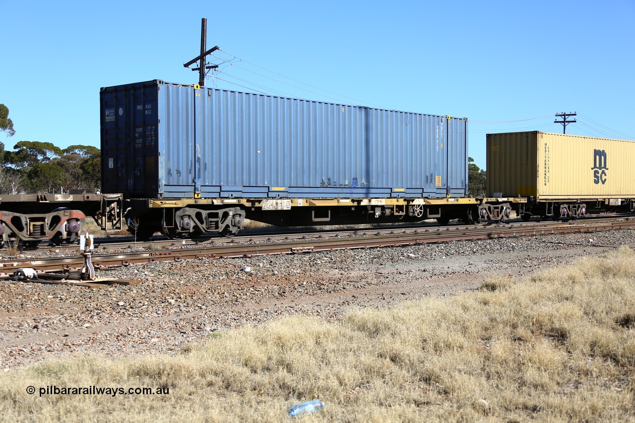 160522 2167
Parkeston, 6MP4 intermodal train, NQOY 14943 container waggon, one of fifty units built by Comeng NSW in 1974-75 as OCY type, with a 48' Royal Wolf container in Pacific National service as PNXD 4165.
Keywords: NQOY-type;NQOY14943;Comeng-NSW;OCY-type;