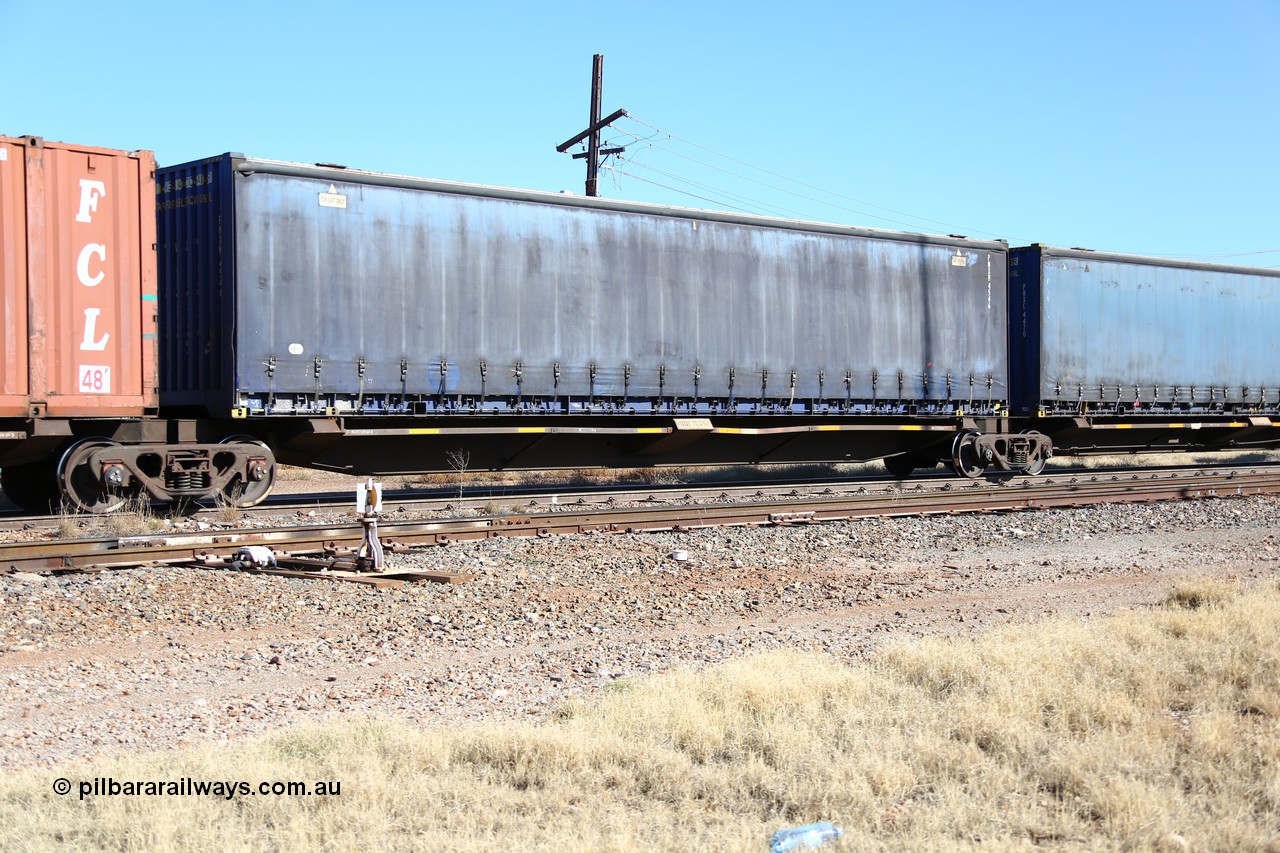 160522 2176
Parkeston, 6MP4 intermodal train, RQQY 7076 platform 2 of 5-pack articulated skel waggon set, 1 of 17 built by Qld Rail at Ipswich Workshops in 1995, 48' curtainsider PNXM 4546.
Keywords: RQQY-type;RQQY7076;Qld-Rail-Ipswich-WS;