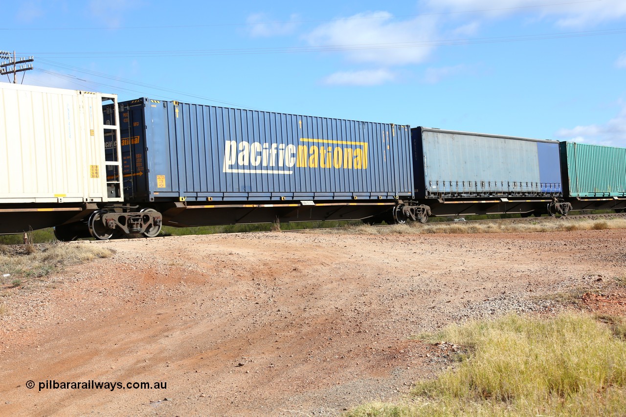 160522 2423
Parkeston, 7MP7 priority service train, RQQY 7079 platform 2 of 5-pack articulated skel waggon set, 1 of 17 built by Qld Rail at Ipswich Workshops in 1995, Pacific National 48' box PNXD 4209.
Keywords: RQQY-type;RQQY7079;Qld-Rail-Ipswich-WS;