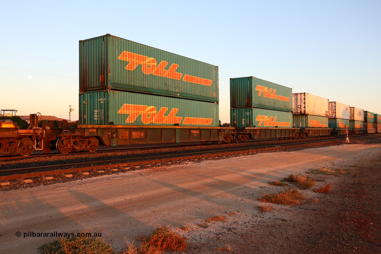 160523 2727
Parkeston, 1PM5 intermodal train, RRXY 11 a 5-pack well waggon set, last of eleven built by Bradken Qld in 2002 for Toll from a Worley-Williams design with a mostly Toll 48' stacked boxes.
Keywords: RRXY-type;RRXY11;Worley-Williams;Bradken-Rail-Qld;