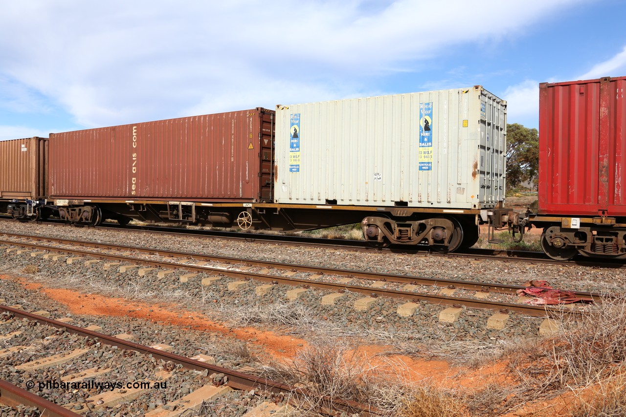 160523 2972
Parkeston, intermodal train 7SP3, RQFY 116 container waggon, built by Victorian Railways Bendigo Workshops in 1980 as a batch of seventy five VQFX type skeletal container waggons, recoded to RQFF then 2CM bogies fitted in 1995. Royal Wolf 20' box RWTU 989258 and a 40' sea axis SAXU 491062.
Keywords: RQFY-type;RQFY116;Victorian-Railways-Bendigo-WS;VQFX-type;RQFF-type;