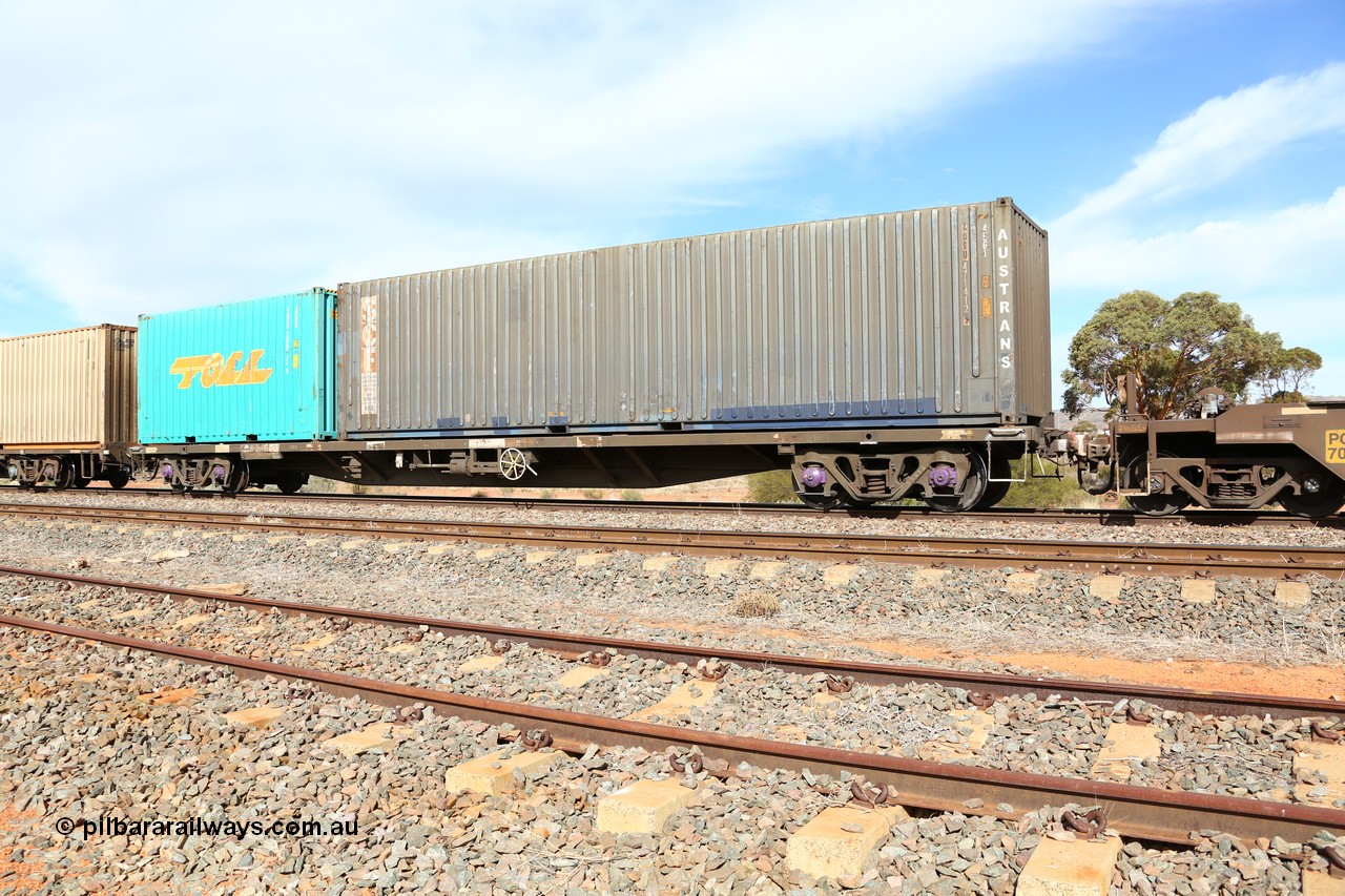 160523 2989
Parkeston, 7SP3 intermodal train, RQAY 21913 container waggon, one of a hundred waggons built in 1981 by EPT NSW as type NQAY, recoded to RQAY in 1994. Loaded with an SCF leased 40' 4EG1 type container Austrans AUSU 471412 [1] and a 20' 2EB0 type Toll box TOSU 200672 [9].
Keywords: RQAY-type;RQAY21913;EPT-NSW;NQAY-type;