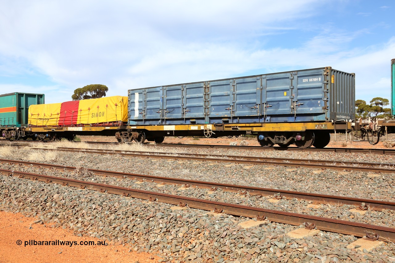 160523 2993
Parkeston, 7SP3 intermodal train, RQEY 1957 2-pack container waggon, originally built by Comeng Qld as the first of forty LEX type louvre waggons in 1966-67, recoded to ALEX, converted to AQEY, recoded to RQEY. Loaded with an SCF half height side door 40' box SCFU 607084 and a Simon 40' flat rack FD 131 with a Simon tarped load.
Keywords: RQEY-type;RQEY1957;Comeng-Qld;LEX-type;ALEX-type;AQEY-type;