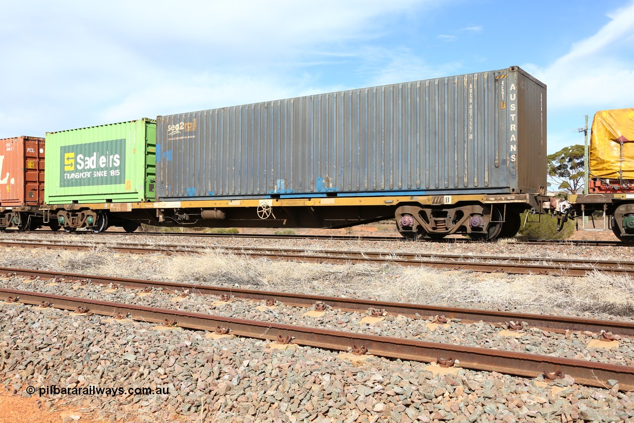 160523 2997
Parkeston, 7SP3 intermodal train, RQSY 35038 63' container waggon, one of a hundred OCY type waggons built by Goninan NSW in 1975, recoded to NQOY, then NQSY. Loaded with an Austrans leased Sea2Rail 40' 4EG1 type box AUSU 407227 [4] and a Sadleirs 20' 2EB0 type box RCSB 5111.
Keywords: RQSY-type;RQSY35038;Goninan-NSW;OCY-type;NQOY-type;NQSY-type;