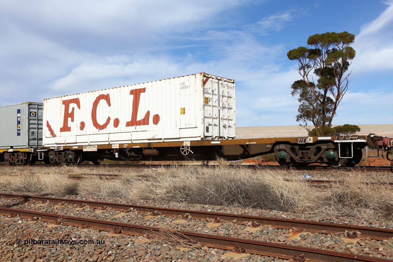 160523 3003
Parkeston, 7SP3 intermodal train, RQGY 34379 63' container waggon, originally built in a batch of one hundred by Goninan NSW between 1974 and 75 as OCY type, recoded to NQOY then NQSY. Loaded with an FCL 40' box FJSV 429129 [9].
Keywords: RQGY-type;RQGY34379;Goninan-NSW;OCY-type;