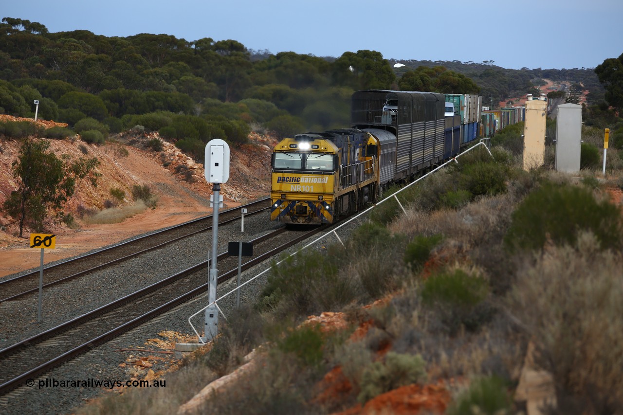 160524 3732
West Kalgoorlie, 2PM6 intermodal train passes the local 2 km post for the Esperance line as it arrives behind Goninan built GE model Cv40-9i NR class units NR 101 serial 7250-07/97-303 and NR 105 serial 7250-08/97-310, originally built for National Rail now in current owner Pacific National livery.
Keywords: NR-class;NR101;Goninan;GE;Cv40-9i;7250-07/97-303;