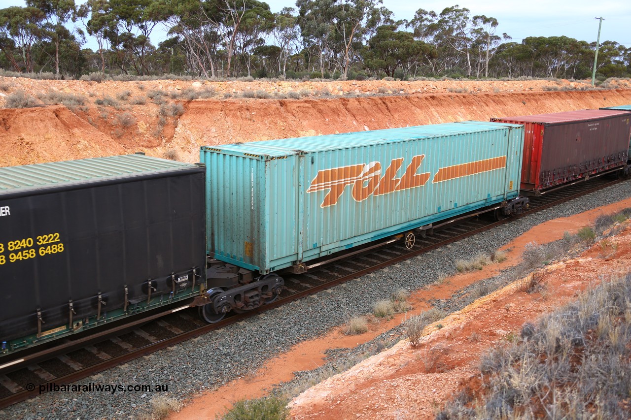 160524 3753
West Kalgoorlie, 2PM6 intermodal train, RRQY 8313 platform 3 of 5-pack articulated skel waggon, one of forty one sets built by Qiqihar Rollingstock Works China in 2006 loaded with a Toll 48' box TDDS 48606.
Keywords: RRQY-type;RRQY8313;Qiqihar-Rollingstock-Works-China;