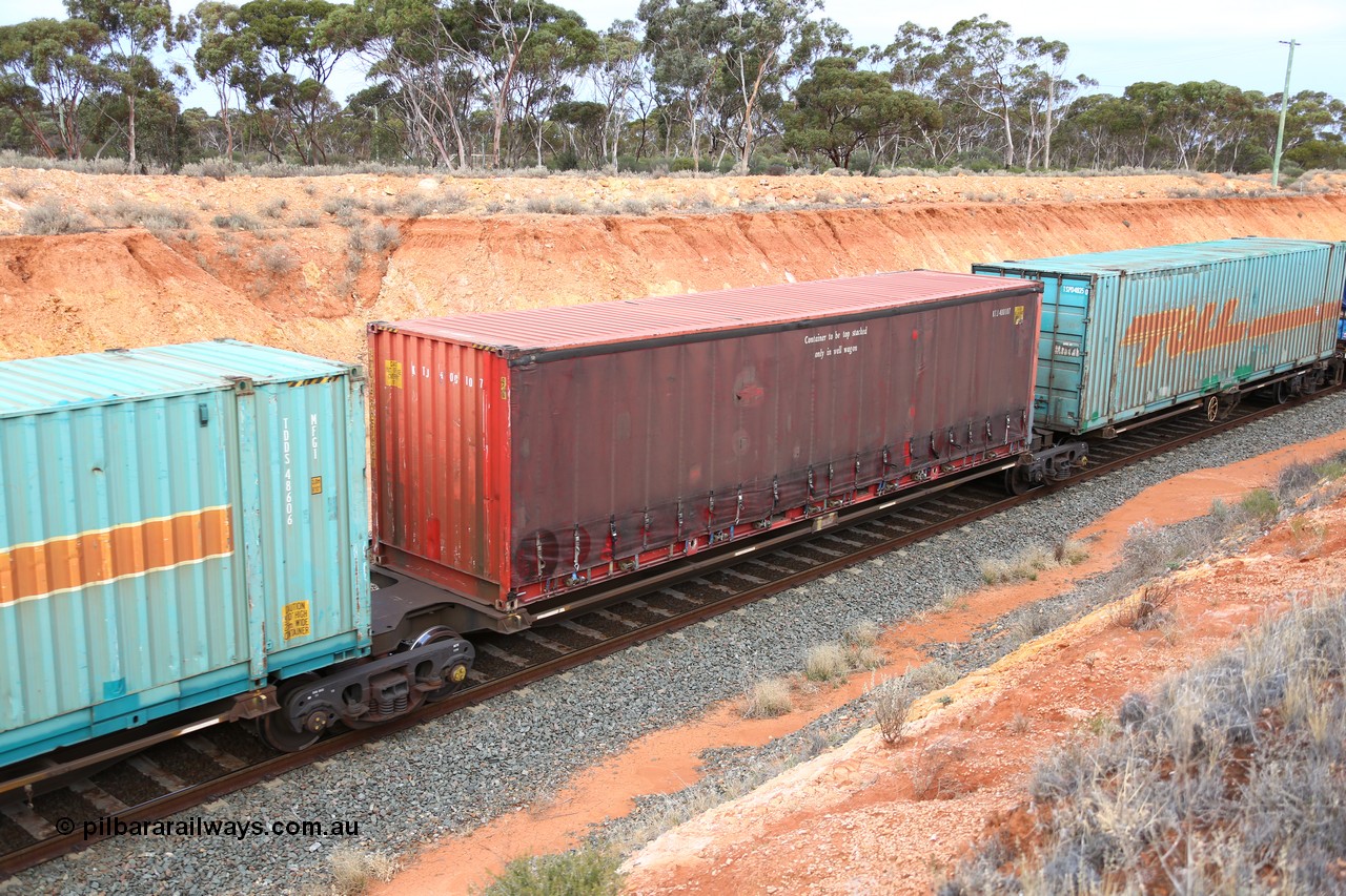 160524 3754
West Kalgoorlie, 2PM6 intermodal train, RRQY 8313 platform 2 of 5-pack articulated skel waggon, one of forty one sets built by Qiqihar Rollingstock Works China in 2006 loaded with a 40' KTJ red curtainsider KTJ 400107.
Keywords: RRQY-type;RRQY8313;Qiqihar-Rollingstock-Works-China;