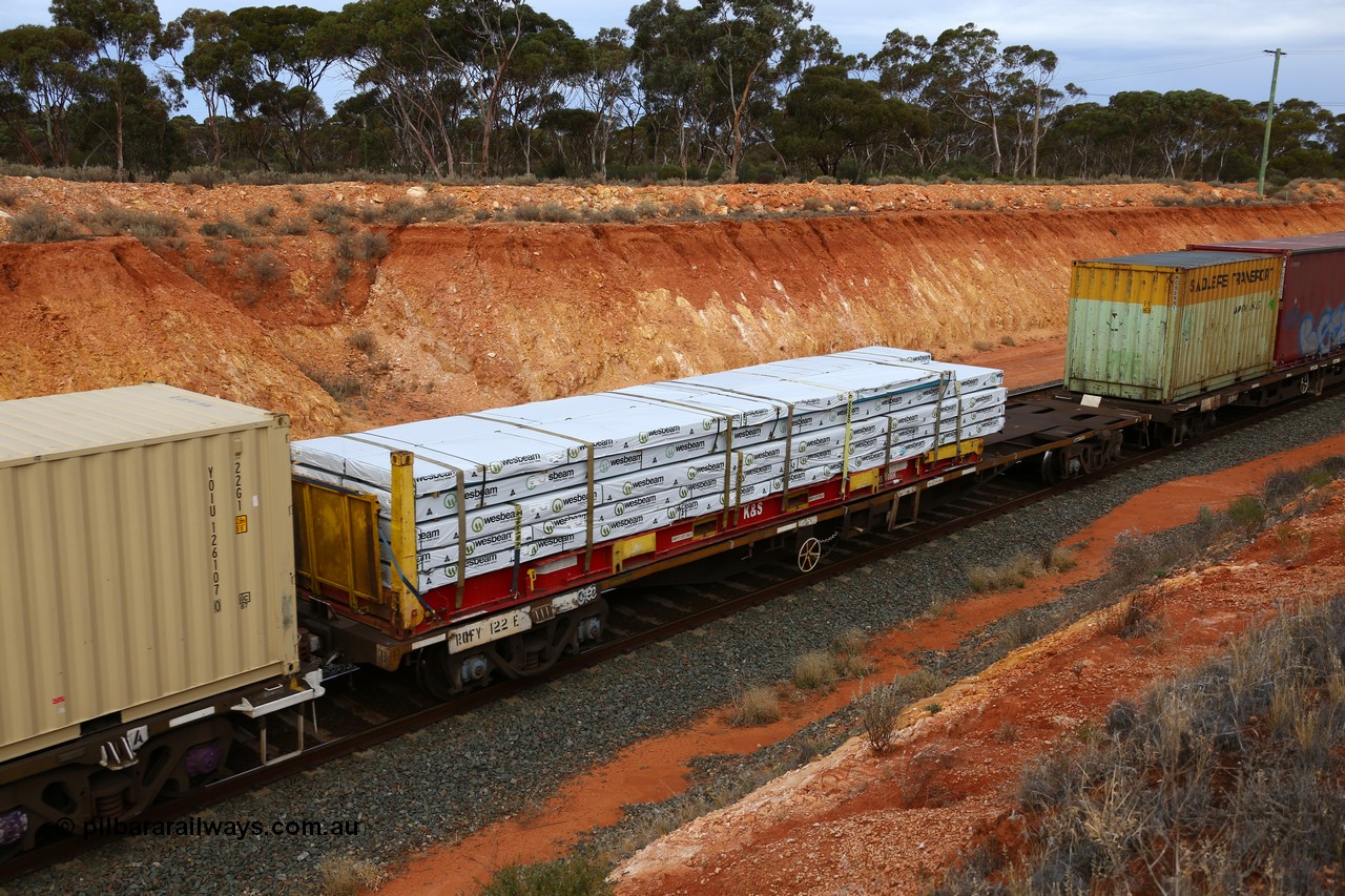 160524 3757
West Kalgoorlie, 2PM6 intermodal train, RQFY 122 container waggon, built by Victorian Railways Bendigo Workshops in 1980 as a batch of seventy five VQFX type skeletal container waggons, recoded in April 1994 RQFY and 2CM bogies fitted August 1995. K+S 40' flatrack loaded over length .
Keywords: RQFY-type;RQFY122;Victorian-Railways-Bendigo-WS;VQFX-type;RQFF-type;