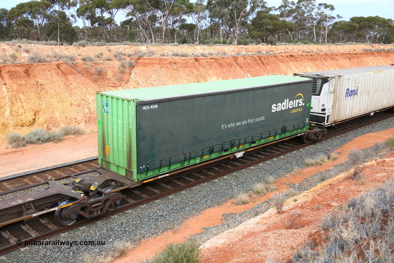 160524 3765
West Kalgoorlie, 2PM6 intermodal train, RRAY 7232 platform 2 of 5-pack articulated skel waggon set, one of 100 built by ABB Engineering NSW 1996-2000, with a 40' Sadleirs curtainsider RCS 4038.
Keywords: RRAY-type;RRAY7232;ABB-Engineering-NSW;