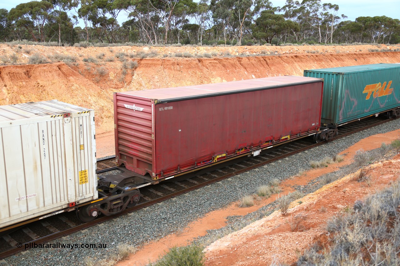160524 3767
West Kalgoorlie, 2PM6 intermodal train, RRAY 7232 platform 4 of 5-pack articulated skel waggon set, one of 100 built by ABB Engineering NSW 1996-2000, with a 40' K+S Freighters curtainsider KTL 401030.
Keywords: RRAY-type;RRAY7232;ABB-Engineering-NSW;