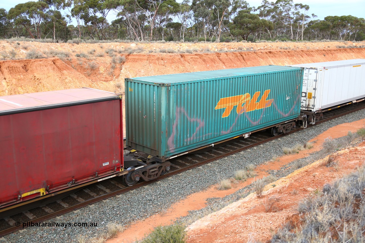 160524 3768
West Kalgoorlie, 2PM6 intermodal train, RRAY 7232 platform 5 of 5-pack articulated skel waggon set, one of 100 built by ABB Engineering NSW 1996-2000, with a 40' Toll box TRRC 410623.
Keywords: RRAY-type;RRAY7232;ABB-Engineering-NSW;