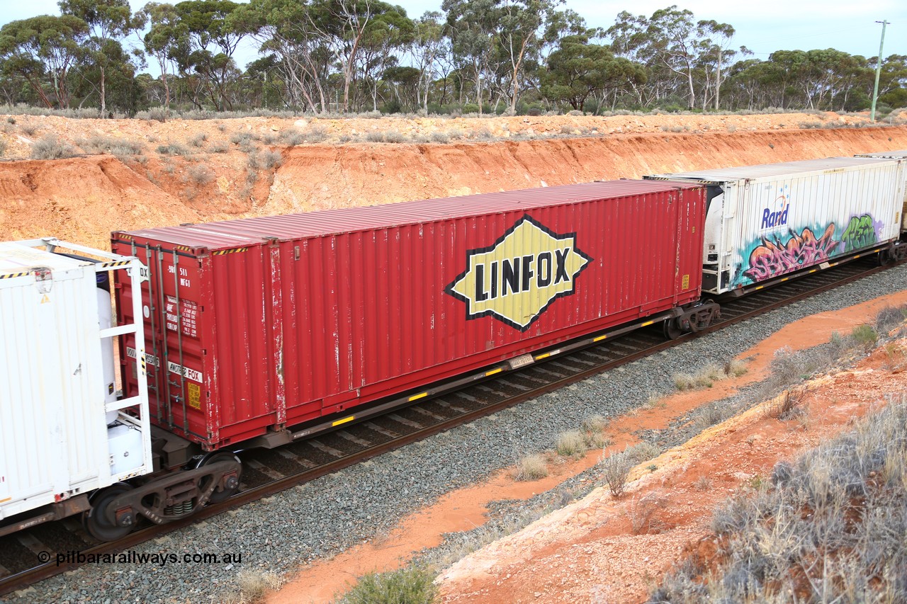 160524 3771
West Kalgoorlie, 2PM6 intermodal train, RQQY 7076 platform 3 of 5-pack articulated skel waggon set, 1 of 17 built by Qld Rail at Ipswich Workshops in 1995, 48' Linfox box DRC 511.
Keywords: RQQY-type;RQQY7076;Qld-Rail-Ipswich-WS;