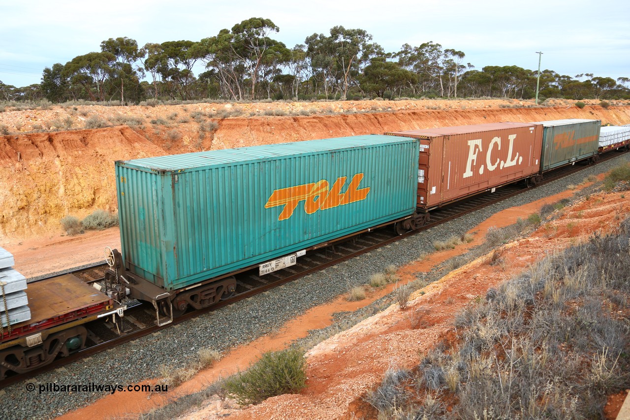160524 3782
West Kalgoorlie, 2PM6 intermodal train, RRGY 7144 platform 1 of 5-pack articulated skeletal waggon set, one of fifty originally built by AN Rail Islington Workshops in 1996-97 as type RRBY, later rebuilt with 48' intermediate decks and recoded to RRGY, Toll 40' box TRRC 410626.
Keywords: RRGY-type;RRGY7144;AN-Islington-WS;RRBY-type;