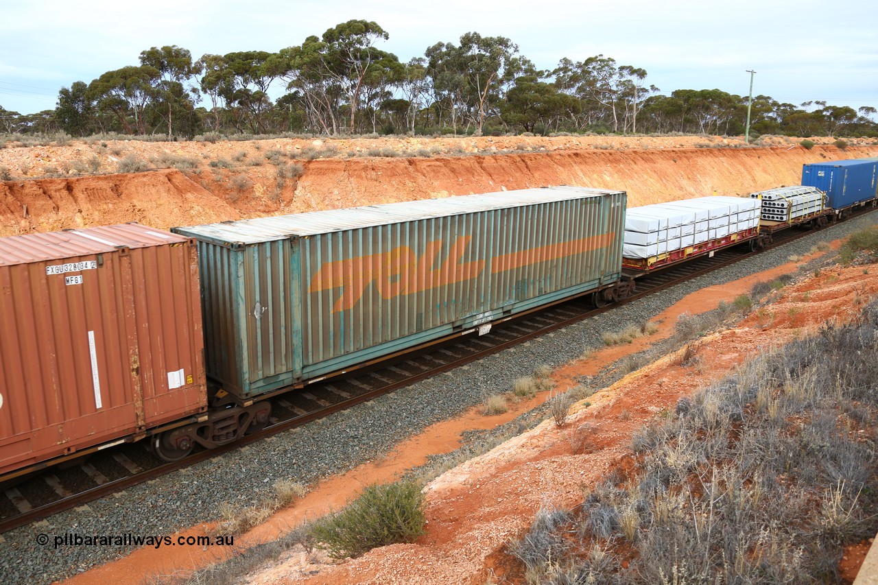 160524 3784
West Kalgoorlie, 2PM6 intermodal train, RRGY 7144 platform 3 of 5-pack articulated skeletal waggon set, one of fifty originally built by AN Rail Islington Workshops in 1996-97 as type RRBY, later rebuilt with 48' intermediate decks and recoded to RRGY, Toll 48' box TERF 48071.
Keywords: RRGY-type;RRGY7144;AN-Islington-WS;RRBY-type;