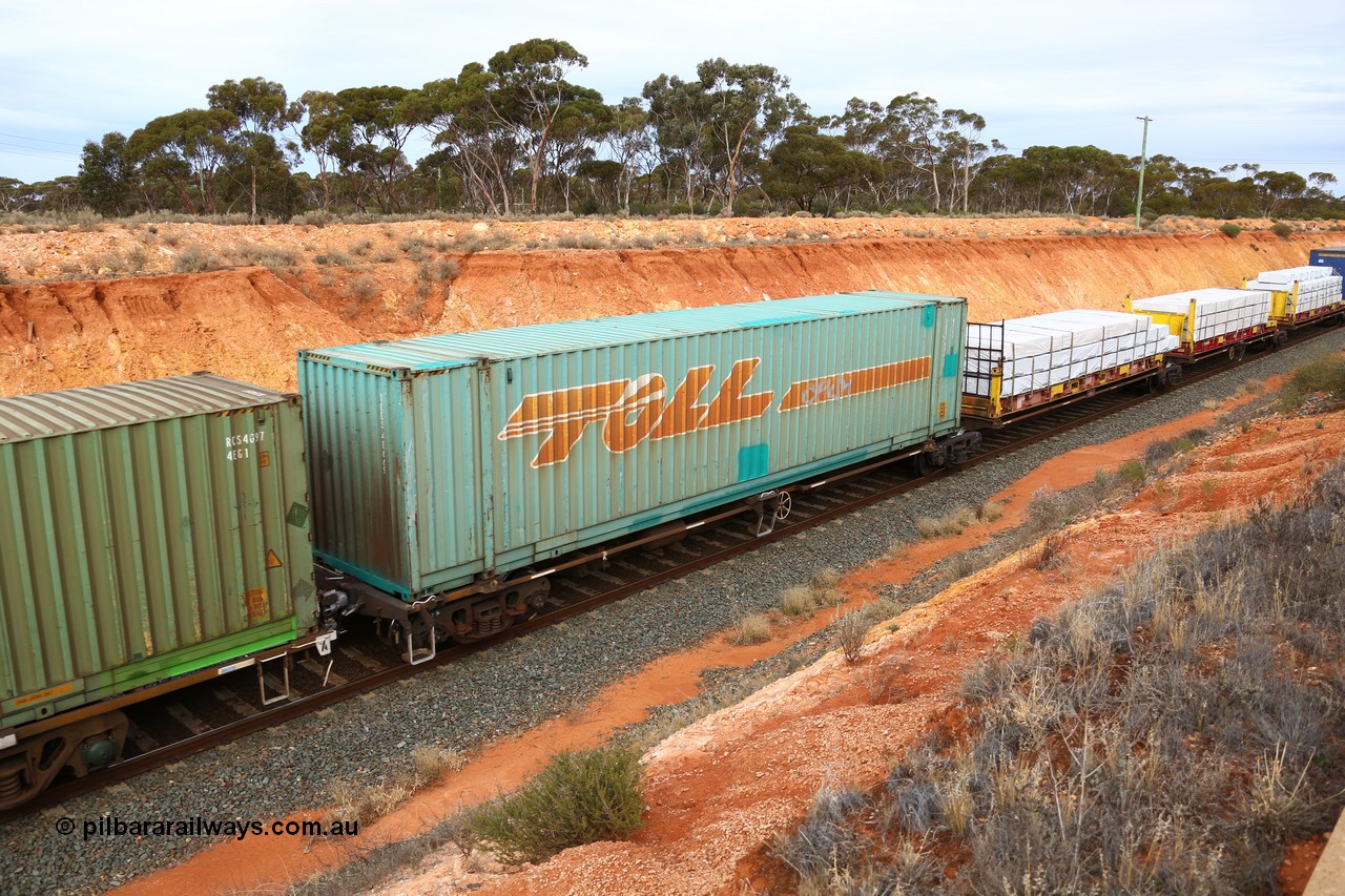 160524 3788
West Kalgoorlie, 2PM6 intermodal train, RRQY 8314 platform 1 of 5-pack articulated skeletal waggon set, built by Qiqihar Rollingstock Works, China in 2012, Toll 48' box TDDS 48669.
Keywords: RRQY-type;RRQY8314;Qiqihar-Rollingstock-Works-China;