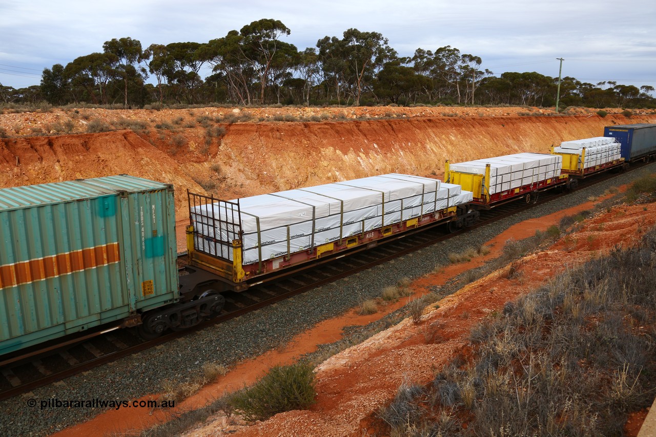 160524 3789
West Kalgoorlie, 2PM6 intermodal train, RRQY 8314 platform 2 of 5-pack articulated skeletal waggon set, built by Qiqihar Rollingstock Works, China in 2012, K+S 40' flatrack KHS 400470.
Keywords: RRQY-type;RRQY8314;Qiqihar-Rollingstock-Works-China;