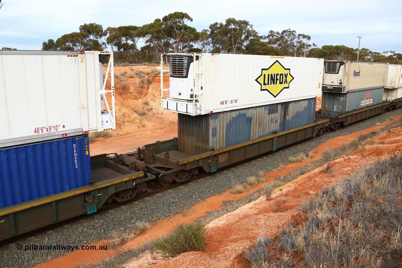 160524 3801
West Kalgoorlie, 2PM6 intermodal train, RRXY 8 platform 4 of 5-pack well waggon set, one of eleven built by Bradken Qld in 2002 for Toll from a Williams-Worley design with a 40' unmarked Railroad Transport box RTPH 4041 in the well and a Linfox 46' MFR3 type reefer FCBD 910612 on top.
Keywords: RRXY-type;RRXY8;Williams-Worley;Bradken-Rail-Qld;