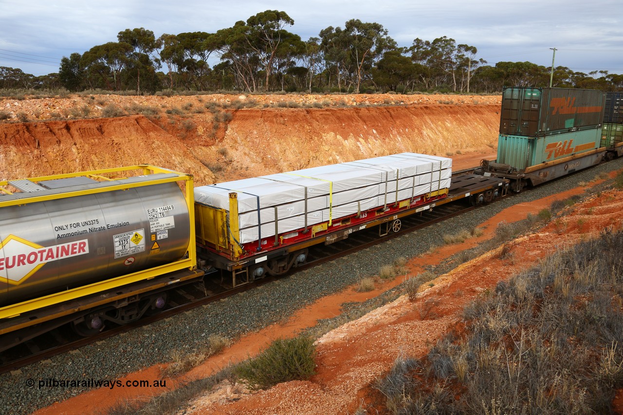 160524 3811
West Kalgoorlie, 2PM6 intermodal train, RQAY 21894 container waggon, one of a hundred waggons built in 1981 by EPT NSW as type NQAY, recoded to RQAY in 1994. Loaded with a K&S 40' flat rack KHS 400820.
Keywords: RQAY-type;RQAY21894;EPT-NSW;NQAY-type;