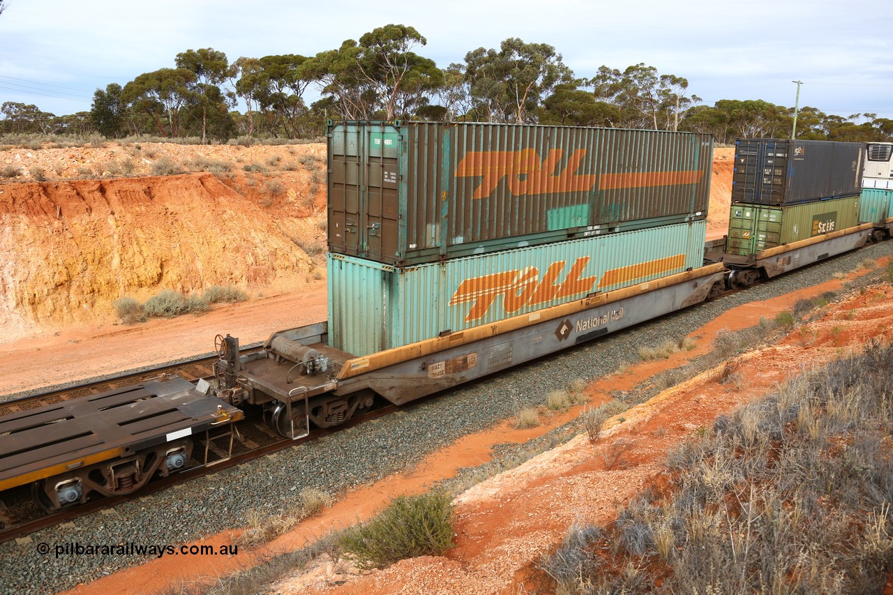 160524 3812
West Kalgoorlie, 2PM6 intermodal train, RQZY 7045 platform 5 of 5-pack well waggon set, one of thirty two sets built by Goninan NSW in 1995-96 for National Rail loaded with two Toll 48' containers MEG1 type TCML 48595 and TERF 48061 ex Macfield.
Keywords: RQZY-type;RQZY7045;Goninan-NSW;