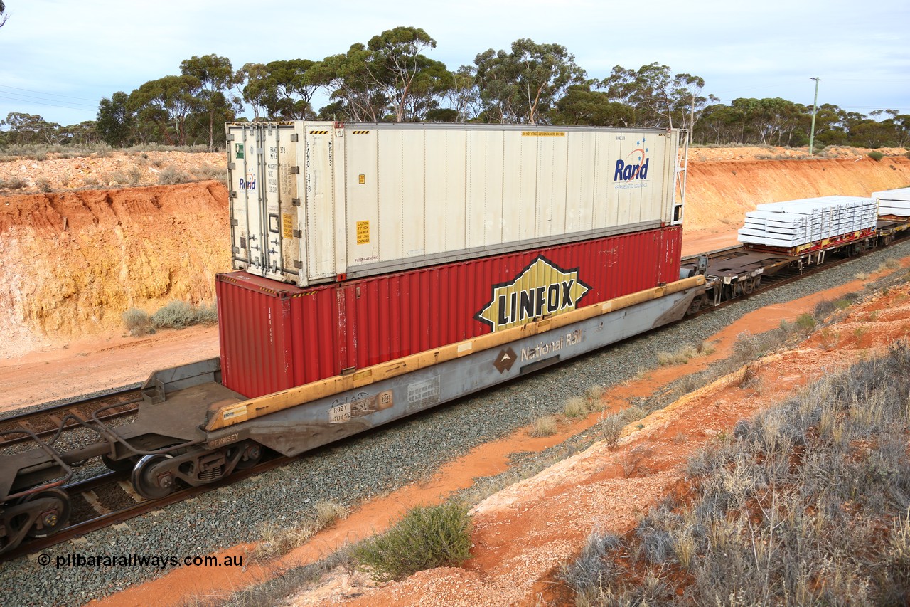 160524 3816
West Kalgoorlie, 2PM6 intermodal train, RQZY 7045 platform 1 of 5-pack well waggon set, one of thirty two sets built by Goninan NSW in 1995-96 for National Rail loaded with Linfox 48' MFG1 container DRC 455 double stacked with RAND Refrigerated Logistics 46' MFR1 type reefer RAND 378.
Keywords: RQZY-type;RQZY7045;Goninan-NSW;